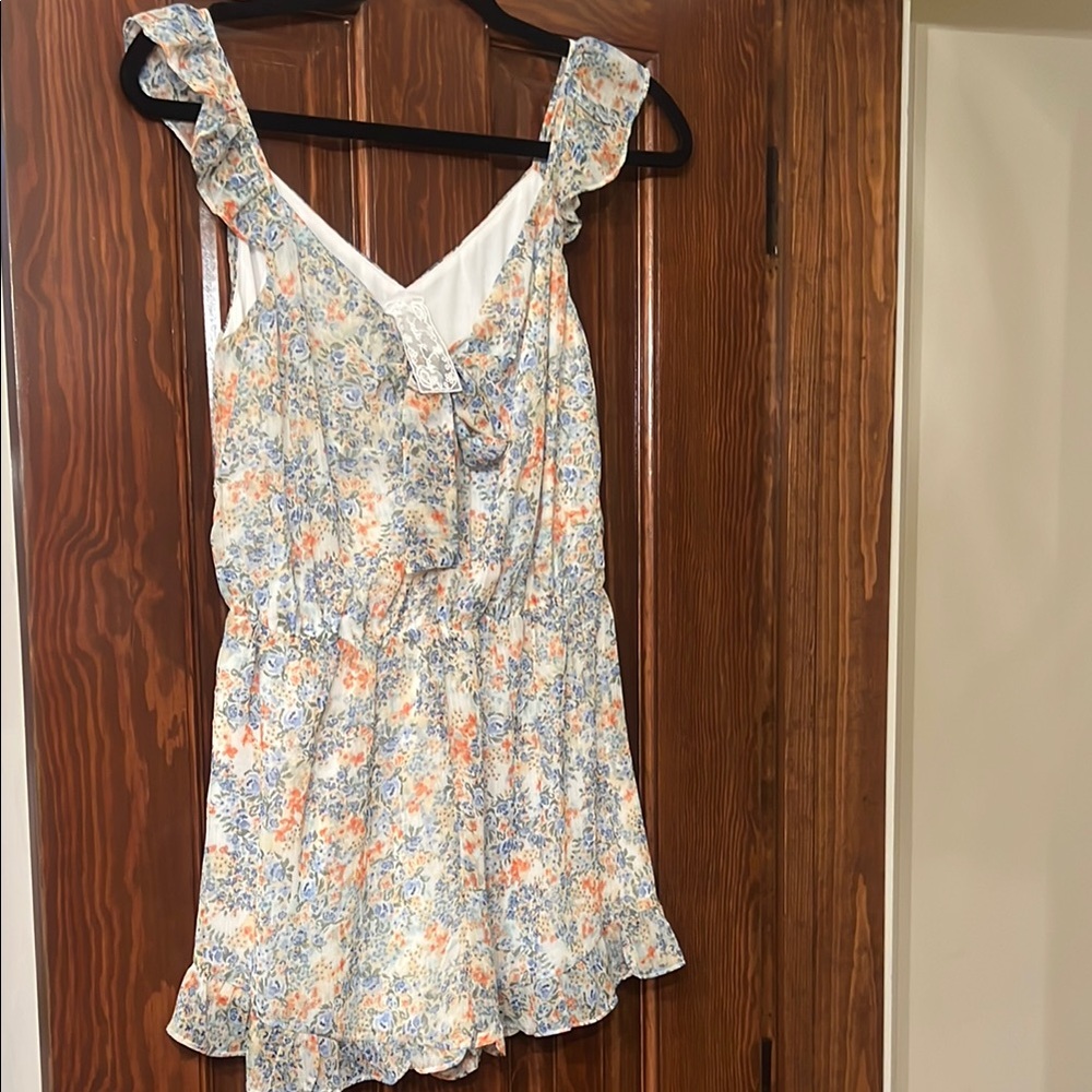 Sadie & Sage Orange Ruffled Sleeveless Jumpsuit